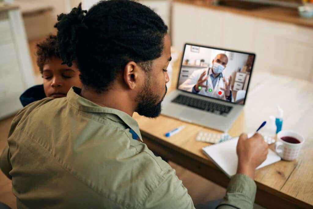 A doctor uses telehealth to decrease appointment cancellations.